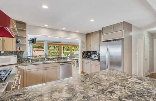 Greenport West House | Colonial-Style Home on 0.48 Acres, Spacious Living and Entertaining Areas,...