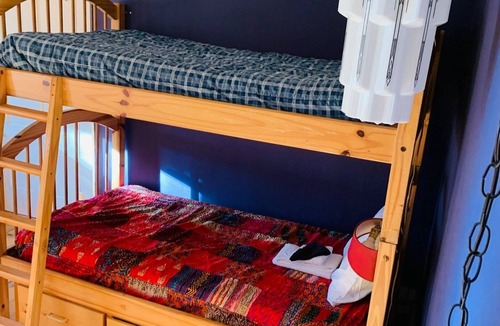 Rowe Bed & Breakfast | Colorful Bunk Bed Room, Cozy Farmhouse Retreat - Purple Dorm
