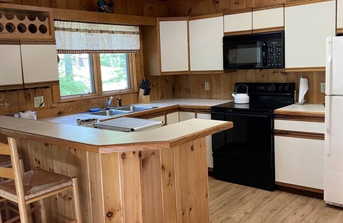 Chocorua Ski and Beach House | Cozy cabin with hot tub in a peaceful setting!