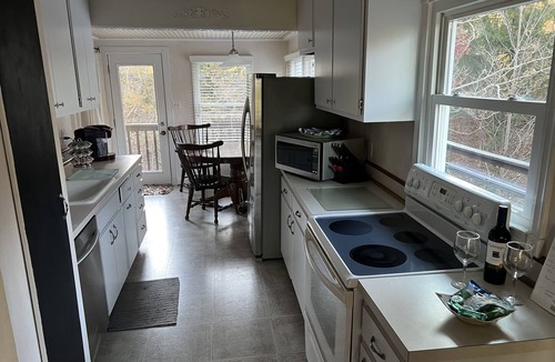 Port Republic Cottage | Cozy Cottage with access to and partially obstructed views of the bay.
