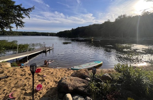 Barnstead House | Cozy home with private beach on Huntress Pond and short drive to skiing!