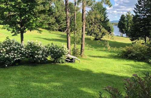 Derby Cabin | Cozy lakeside cabin with AC and WiFi . 240 ft private beach and dock