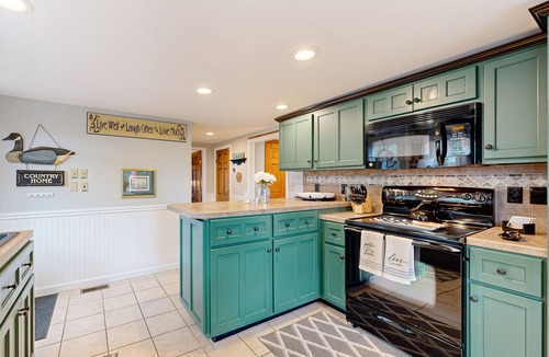 Gilmanton House | Dog-friendly retreat near the tranquil pond shore with spacious deck and dock