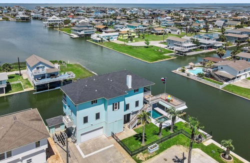 Jamaica Beach House | Dreams Float! - Expansive Decks, Pool, Elev, 2 Masters - Canal w Epic Views