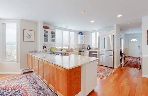 Waterbury Center House | Elegant & renewed mountain-view home with private hot tub, large deck & backyard