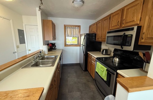 Southwest Harbor Condo | Enjoy the stunning ocean view from the hot tub!