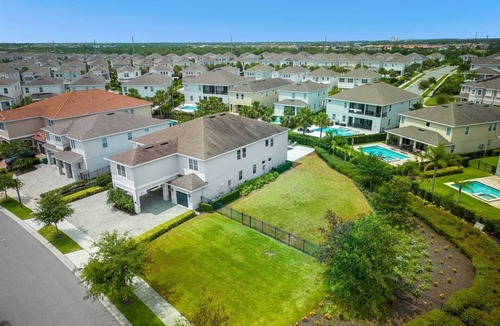 West Kissimmee Villa | Epic Family Retreat | Poolside Lounge, Home Theater & Game Haven