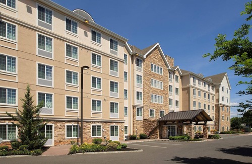 North Brunswick Condo | Free Breakfast. Pool & Hot Tub. Quick Drive to Rutgers University!