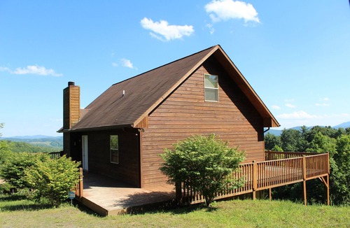 Grassy Creek Cabin | From Fireplace Evenings to Deckside Sunsets- Above It All Has It All