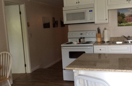 Westfield Apartment | Garden View- Perfect Getaway, Private Unit. Wifi, Patio, Smart TV, AC.