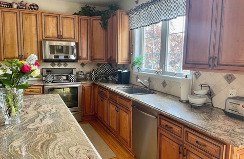 Webster House | Gorgeous house with pool, beautiful backyard, garden and koi fish pond