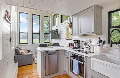 Johnson House | Haven Tiny House w hot tub on river near Stowe