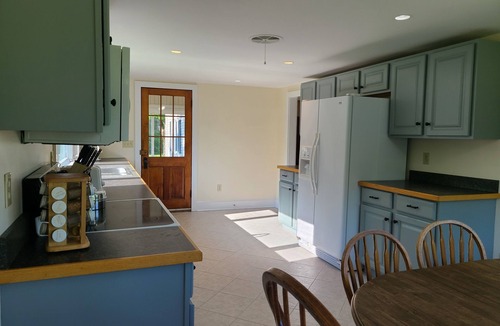 Sandwich House | Hillside home minutes to Center Sandwich and Moultonboro. Single floor living.