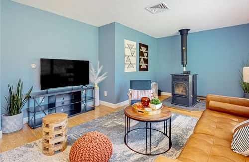 Barnstead House | Inviting riverfront home with pool, kayaks, firepit, & W/D