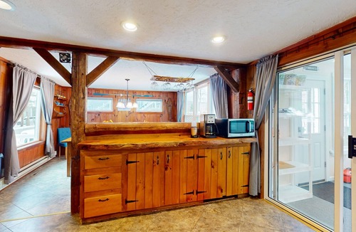 Montgomery Center House | Inviting riverfront home with hot tub on deck & fireplace, near skiing & golf