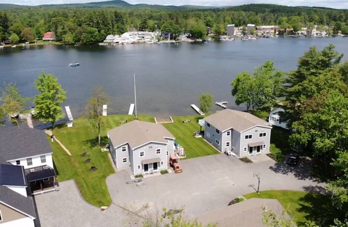 Lochmere House | Lakefront 3-bedroom Duplex on Lake Winnisquam, docks, Beach, WiFi, AC.nB2B