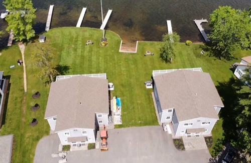 Lochmere House | Lakefront 3-bedroom Duplex on Lake Winnisquam, docks, Beach, WiFi, AC.nB2B