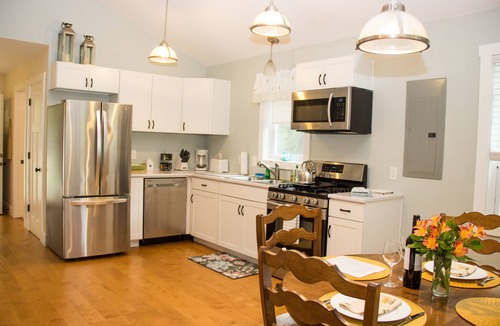 Red Hook Cottage | Lakefront cottage with Year round Hot Tub private beach and dock