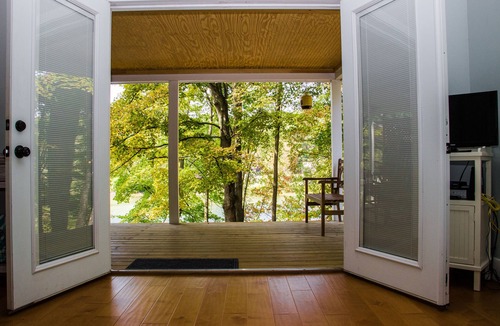 Red Hook Cottage | Lakefront cottage with Year round Hot Tub private beach and dock