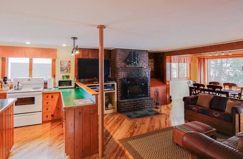 South Hero House | Lakefront Home with Patio Over the Lake, Private Dock, & Stunning Sunset Views
