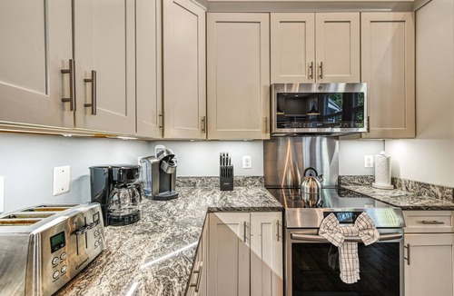 Bumpass House | Lakefront home with views, private hot tub, central AC, dock & waterslide