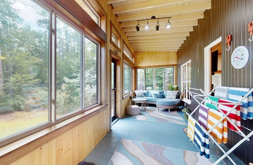 Wakefield House | Lakefront house with firepit, beach access, deck, grill, woodstove, & central AC