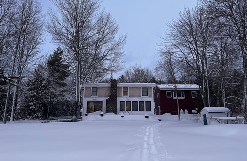 Raymond House | Lakefront Living. Kayak while bald eagles soar above and loons call out.