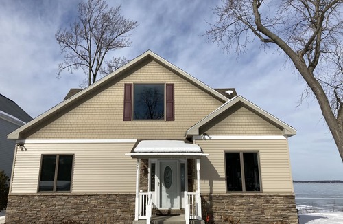 Malletts Bay House | Lakeside retreat with grill, fireplace, W/D, AC & sunset views - dog-friendly