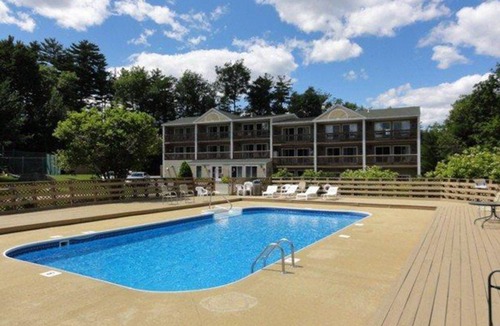 Gilford Condo | Lakeview condo with tennis, sauna, shared pool & a private beach