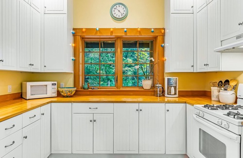 Rosario House | Lovely Orcas Island craftsman-style home in a serene setting with inviting deck