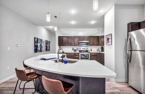 Gateway District Apartment | Luxe Flat w/Heated Pool & Sauna Gym Heart of DT