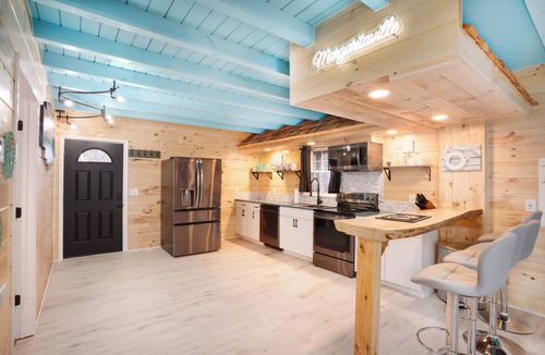 Creola Cabin | Margaritahills is the perfect getaway for two couples, where rustic elegance meets modern comfort.