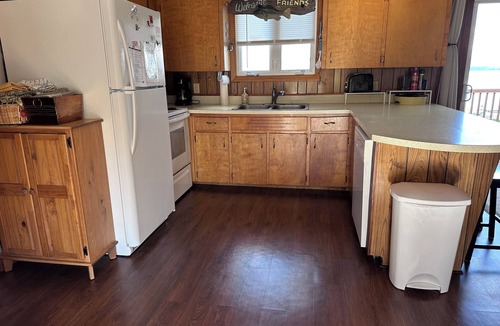 Newport Center House | Memphremagog lakefront home, large yard, waterfront, dock, and small beach