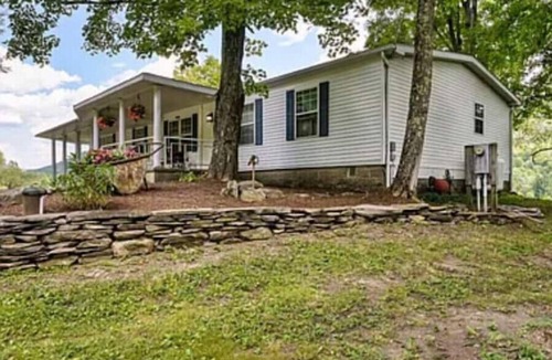 Charlotteville House | Modern home overlooking private lake and mountains. Pet Friendly!