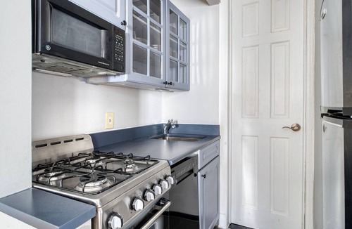West Village Apartment | Modern West Village 1BR w/Balcony & In-Unit W/D, by Blueground