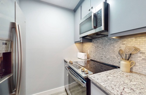 Warren Condo | Mountain Condo with Three Pools, Hot Tub, Tennis, Game Room & Gym