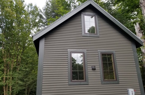 Craftsbury Cabin | Northwoods Guest Cabin and firepit & porch overlooking private woods and stream