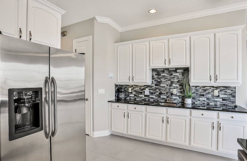 Reunion Villa | Oasis Villa | 5BR, 4.5 Bath Luxe Home w/Private Pool, Arcade, and Theater Near Orlando Theme Parks