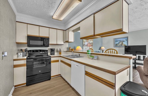 Kure Beach Condo | Ocean Dunes 104 – Spacious oceanfront condo at Ocean Dunes in Kure Beach