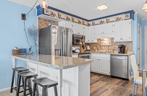 Morehead City Condo | Ocean-view condo with beach access, WiFi, pool, washer/dryer, & AC