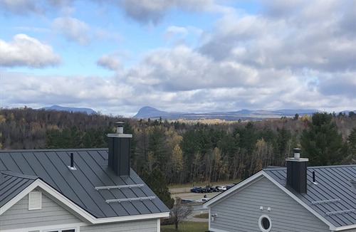 East Burke Condo | On Burke Mountain, bike in bike out. Pool, Hot tub, Gym access at the hotel.