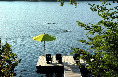Walton Park Cabin | Osseo Lake Lodge Unique Octagon Home with Sunset Views & Private Waterfront
