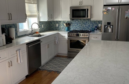 Silver Beach House | Private heated pool and spacious yard. 5 minute walk to the beach.