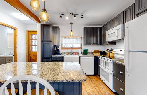 Warren House | Remodeled ski chalet with wood stove, on shuttle route between two ski mountains