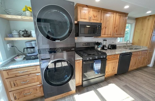 Lochmere House | Remodeled Winnisquam Lakefront Home - Private Dock/AC/Dogs/Kayaks/SUPs/Fire Pit
