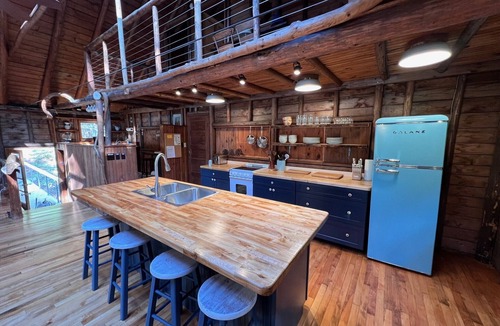 West Point Cabin | Renovated 3-BR boathouse built atop water in quiet cove; private float & trails