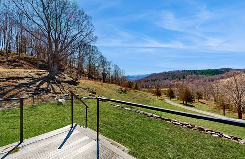 Pawlet House | Riverfront estate, mountain views, dog-friendly, fireplace, balcony, w/d, wifi