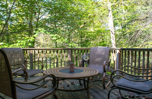 Elkins House | Riverfront luxury in the woods - main level master bedroom