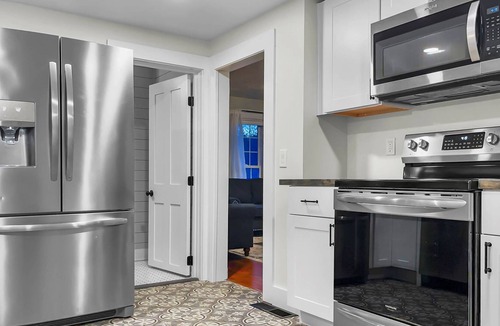 Carroll County House | Rivers Edge: Modern, Huge Riverfront & Yard, Kayaks - Dog OK, Grill, Fast WiFi