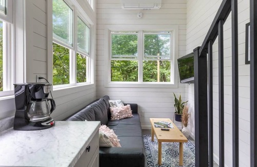 Johnson Cabin | Riverside Tiny House with hot tub near Stowe